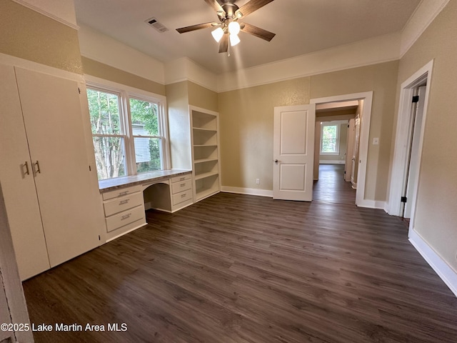 104 Central Blvd, East Tallassee, AL 36078 - unfurnished office with built in study area, dark wood finished floors, ceiling fan, and built in features