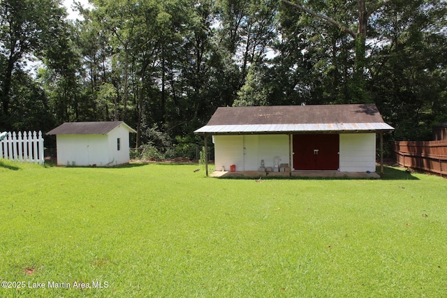 295 Landers Loop, Sylacauga, AL 35150 - fenced backyard featuring a shed