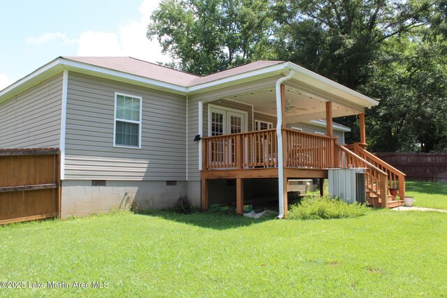 295 Landers Loop, Sylacauga, AL 35150 - back of property featuring crawl space, a ceiling fan, and a wooden deck