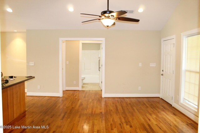 295 Landers Loop, Sylacauga, AL 35150 - unfurnished living room with a ceiling fan, wood finished floors, and recessed lighting