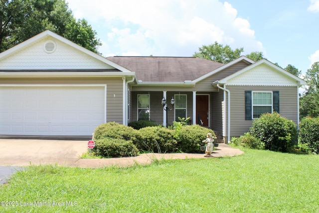 295 Landers Loop, Sylacauga, AL 35150 - ranch-style home featuring a front yard, concrete driveway, a garage, a shingled roof, and covered porch