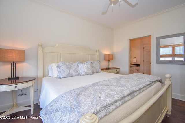 bedroom with connected bathroom, dark wood-type flooring, ornamental molding, and ceiling fan