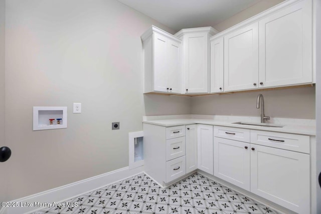 laundry room featuring cabinets, hookup for an electric dryer, sink, and washer hookup