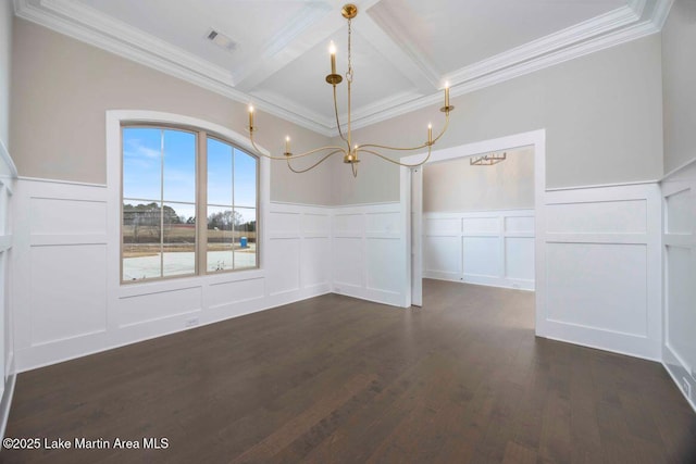 unfurnished dining area featuring beamed ceiling, coffered ceiling, dark wood-type flooring, and a notable chandelier