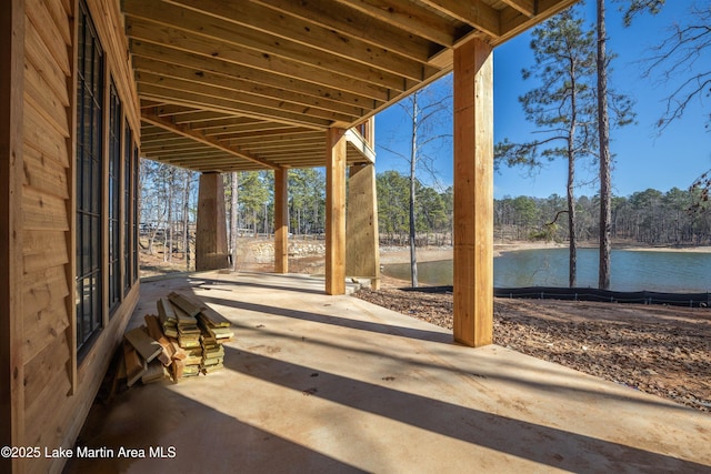 view of patio featuring a water view