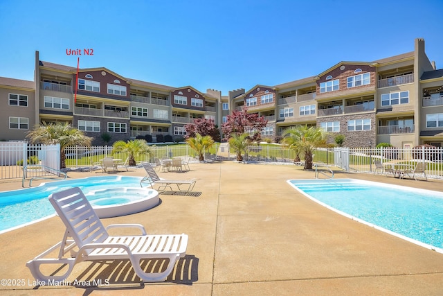 189 Williams Rd Unit # N2, Alexander City, AL 35010 - community pool featuring a patio area and a community hot tub