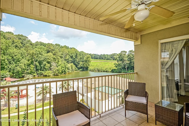 189 Williams Rd Unit # N2, Alexander City, AL 35010 - balcony featuring a water view, a ceiling fan, and a wooded view