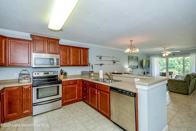 189 Williams Rd Unit # N2, Alexander City, AL 35010 - kitchen featuring appliances with stainless steel finishes, a peninsula, open floor plan, light tile patterned floors, and light countertops