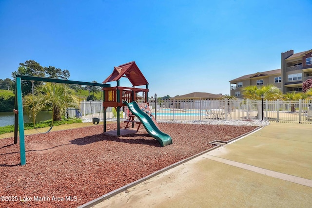 view of play area featuring a community pool