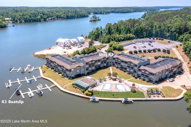 drone / aerial view with a water view