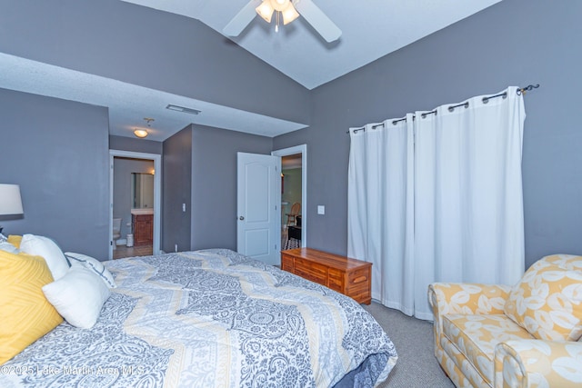 bedroom with ceiling fan, lofted ceiling, and carpet