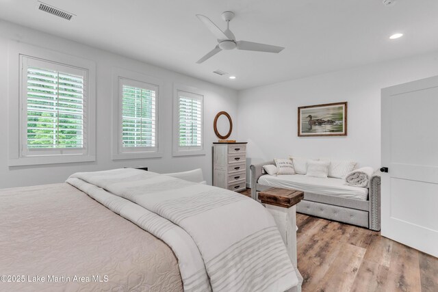 116 Glynmere Park, Alexander City, AL 35010 - bedroom with multiple windows, light wood finished floors, recessed lighting, and ceiling fan
