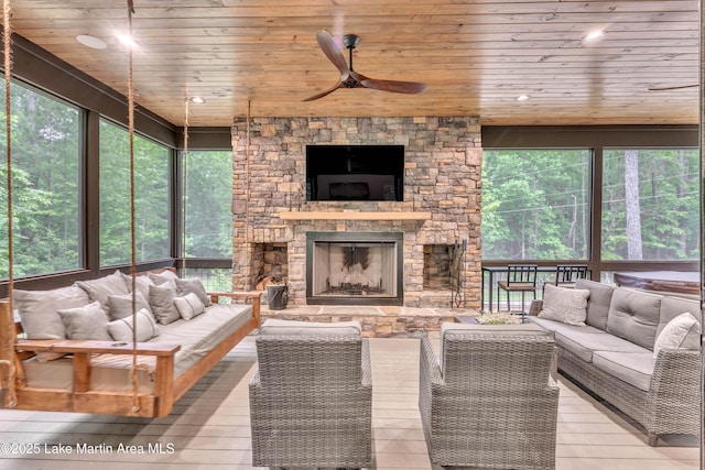116 Glynmere Park, Alexander City, AL 35010 - living area with wooden ceiling, ceiling fan, wood-type flooring, a fireplace, and plenty of natural light