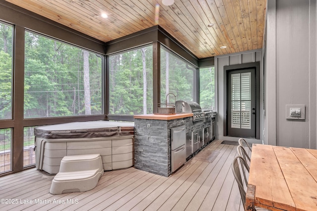 116 Glynmere Park, Alexander City, AL 35010 - sunroom / solarium with a hot tub, exterior kitchen, and healthy amount of natural light