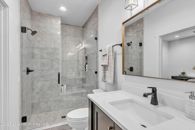 116 Glynmere Park, Alexander City, AL 35010 - bathroom featuring toilet, a shower stall, vanity, and recessed lighting