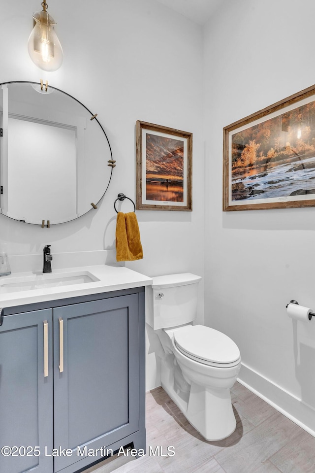 116 Glynmere Park, Alexander City, AL 35010 - bathroom with toilet, vanity, and baseboards