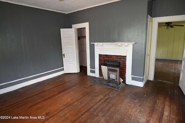 unfurnished living room featuring ceiling fan, wood-type flooring, and ornamental molding