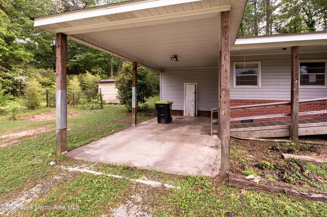 view of patio / terrace featuring a carport