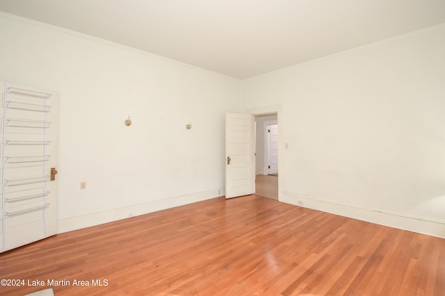 unfurnished room featuring hardwood / wood-style floors