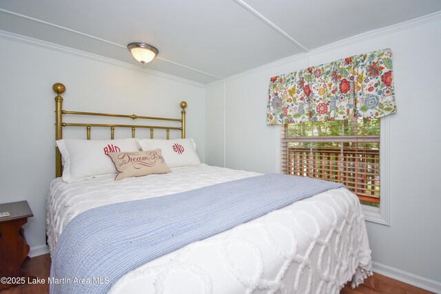476 Brittney Ln, Jacksons Gap, AL 36861 - bedroom with crown molding and wood finished floors