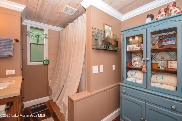 476 Brittney Ln, Jacksons Gap, AL 36861 - full bath featuring vanity, crown molding, and wood ceiling