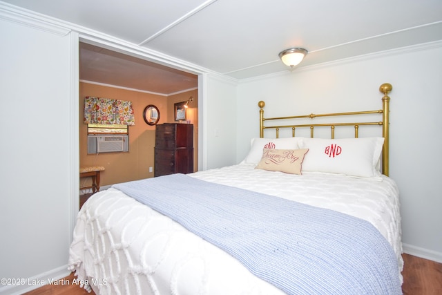 476 Brittney Ln, Jacksons Gap, AL 36861 - bedroom featuring ornamental molding, wood finished floors, and cooling unit