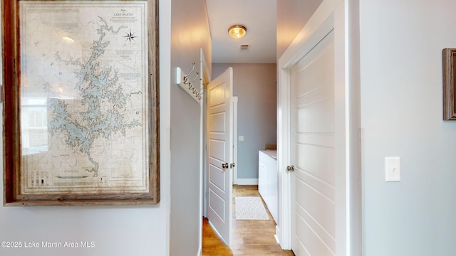 hall featuring light wood-style flooring
