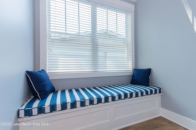 sitting room featuring baseboards