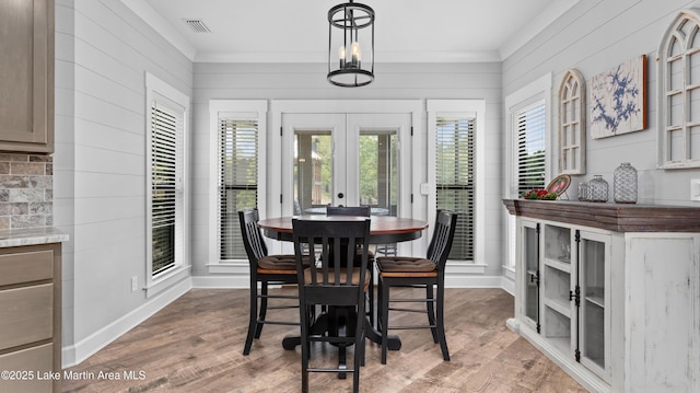 101 Mason Rd, Tallassee, AL 36078 - dining room featuring ornamental molding, french doors, visible vents, and wood finished floors
