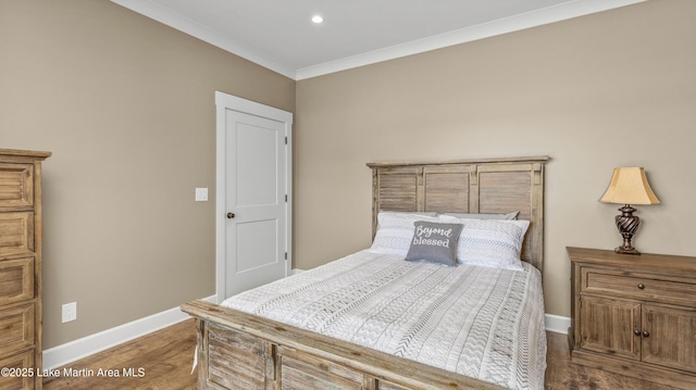 101 Mason Rd, Tallassee, AL 36078 - bedroom featuring crown molding, recessed lighting, baseboards, and wood finished floors