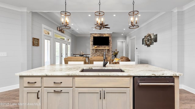 101 Mason Rd, Tallassee, AL 36078 - kitchen featuring open floor plan, ornamental molding, a chandelier, and a sink