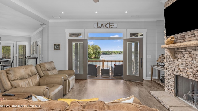 101 Mason Rd, Tallassee, AL 36078 - living room with wood finished floors, a fireplace, ornamental molding, and recessed lighting
