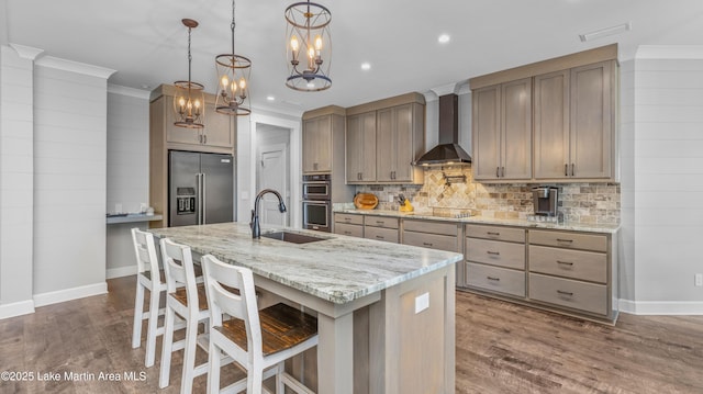 101 Mason Rd, Tallassee, AL 36078 - kitchen featuring a sink, wall chimney exhaust hood, backsplash, baseboards, and appliances with stainless steel finishes