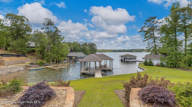101 Mason Rd, Tallassee, AL 36078 - dock area with boat lift, a yard, and a water view