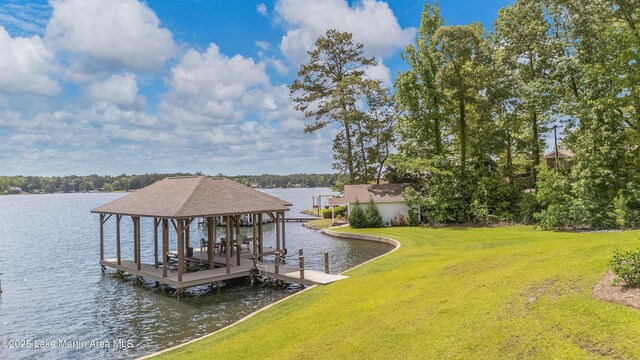 101 Mason Rd, Tallassee, AL 36078 - dock area featuring boat lift, a water view, and a lawn