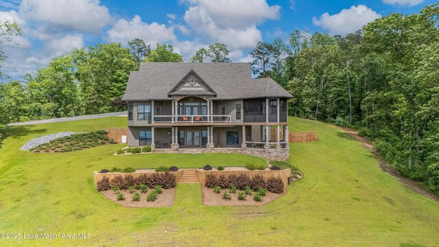 101 Mason Rd, Tallassee, AL 36078 - rear view of property with a yard, a deck, french doors, and a sunroom