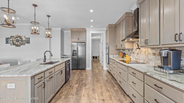 101 Mason Rd, Tallassee, AL 36078 - kitchen featuring a sink, ornamental molding, wall chimney range hood, and appliances with stainless steel finishes