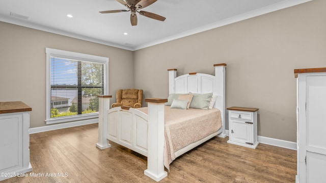 101 Mason Rd, Tallassee, AL 36078 - bedroom with light wood-style flooring, visible vents, baseboards, ornamental molding, and recessed lighting