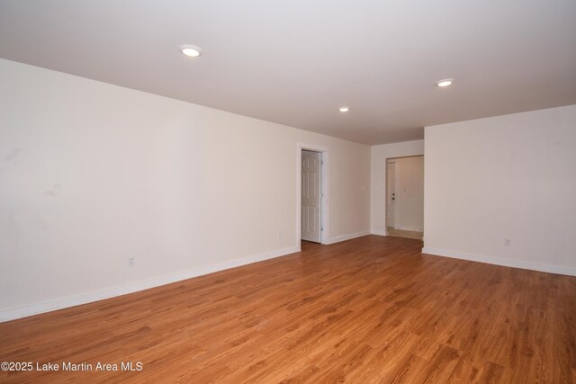 50 Omega Ln, Alexander City, AL 35010 - spare room featuring recessed lighting, baseboards, and light wood finished floors