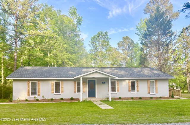 50 Omega Ln, Alexander City, AL 35010 - single story home with concrete block siding, a shingled roof, a porch, and a front yard