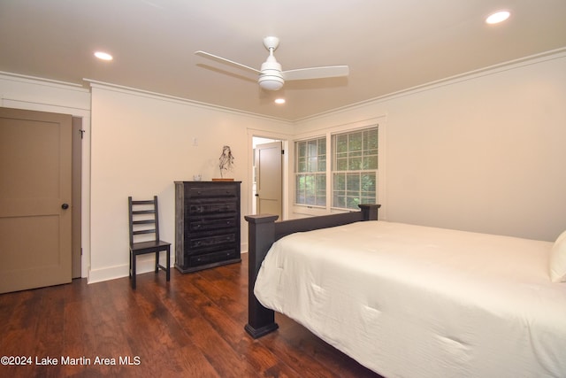 bedroom featuring ceiling fan, dark hardwood / wood-style floors, and ornamental molding