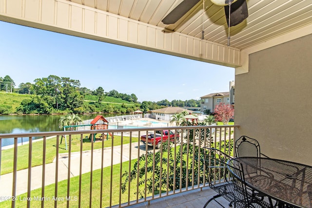 balcony featuring a water view