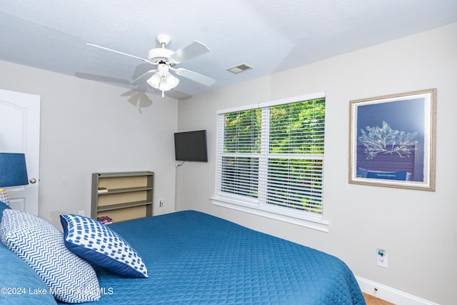 189 Williams Rd Unit E2, Alexander City, AL 35010 - bedroom with baseboards and ceiling fan