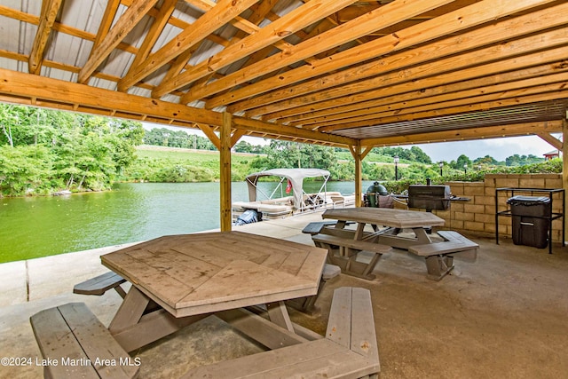 view of patio featuring a water view