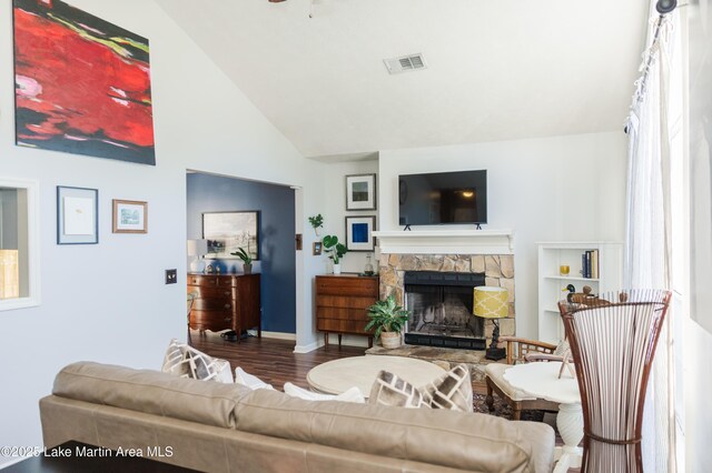 963 Birch Ct, Auburn, AL 36830 - living area with a stone fireplace, high vaulted ceiling, wood finished floors, and ceiling fan