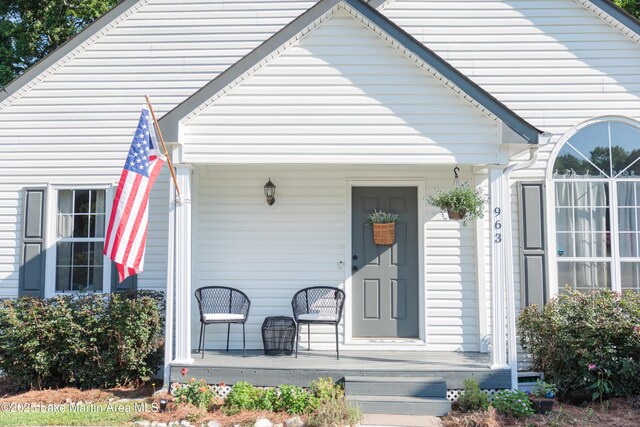 963 Birch Ct, Auburn, AL 36830 - view of exterior entry featuring a porch