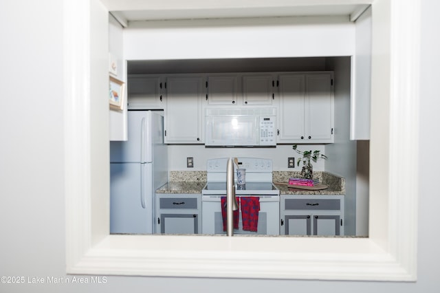 963 Birch Ct, Auburn, AL 36830 - kitchen featuring white appliances, light countertops, and gray cabinetry