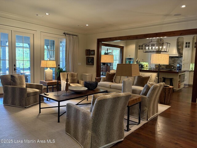 856 Windermere W Pkwy, Alexander City, AL 35010 - living area featuring crown molding, a chandelier, dark wood-type flooring, and recessed lighting