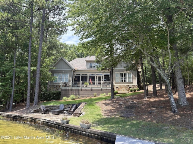 856 Windermere W Pkwy, Alexander City, AL 35010 - back of house featuring a fire pit