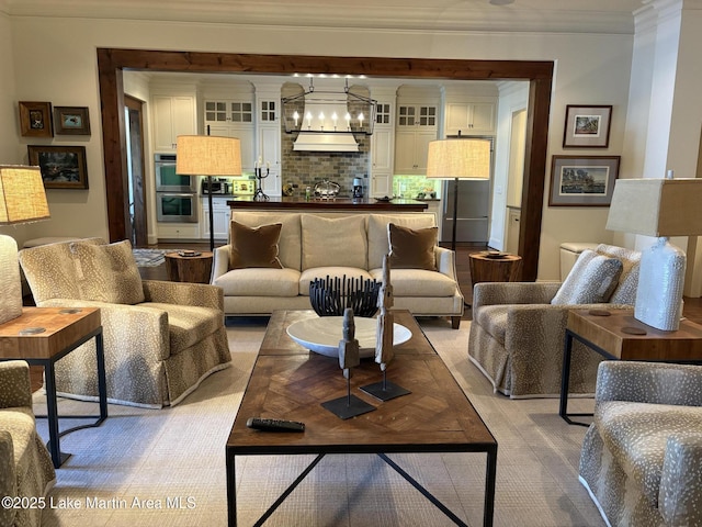 856 Windermere W Pkwy, Alexander City, AL 35010 - living area with a chandelier and ornamental molding